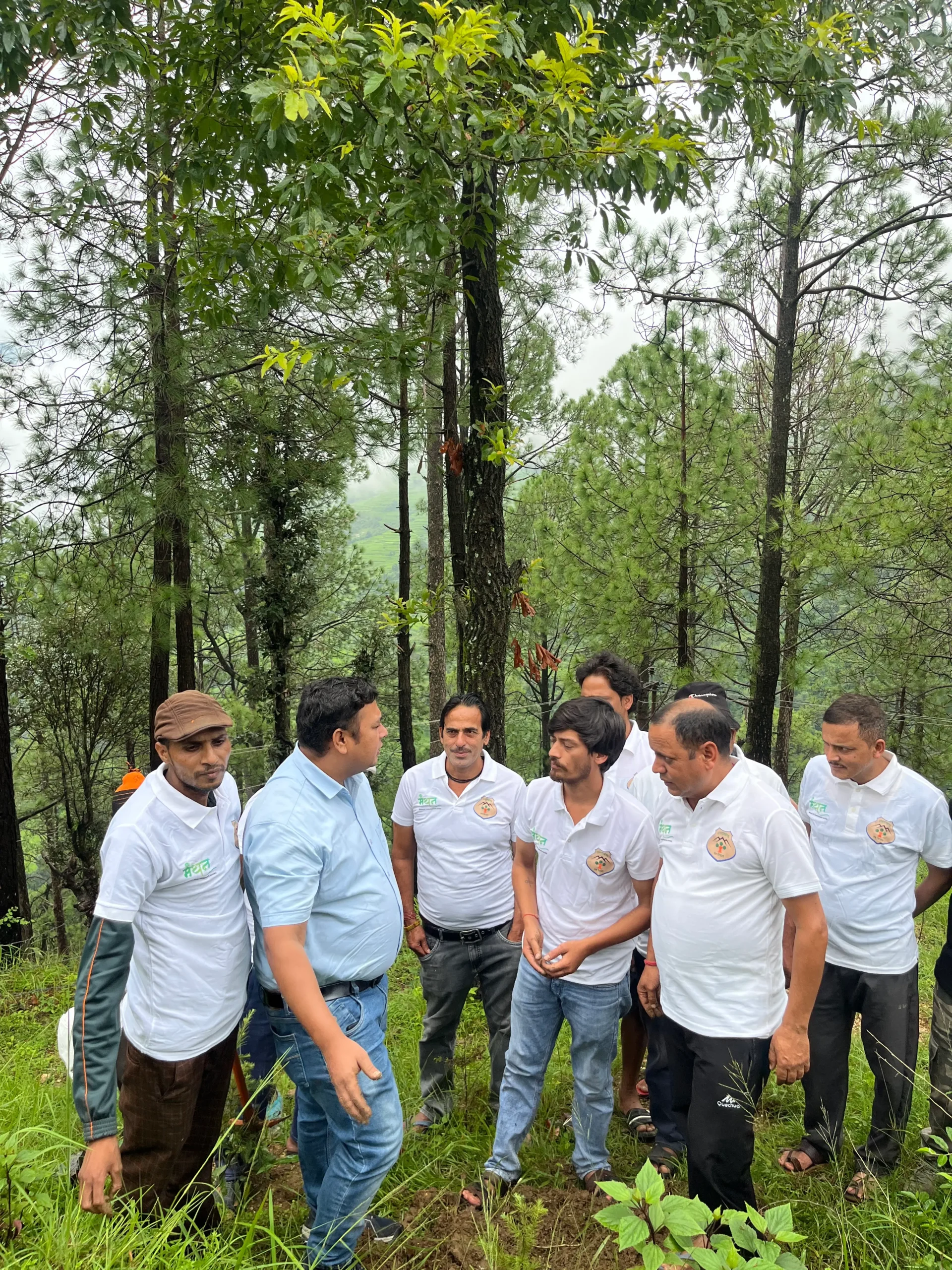 Children and village residents participating in a tree plantation activity in Bangar Valley